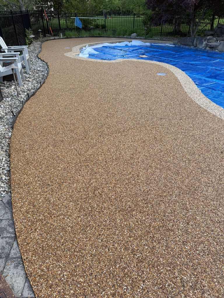 Pool deck with river rock aggregate coating, Central NJ